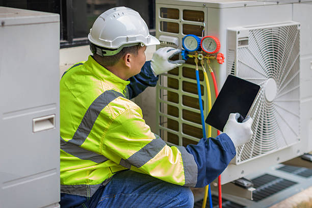 Professional Heat Pump Repair technician working in Auburn Hills, MI